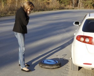 woman with damaged car