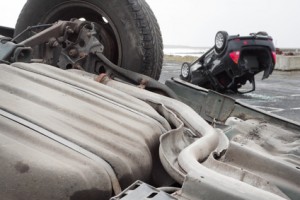 two cars turned upside-down